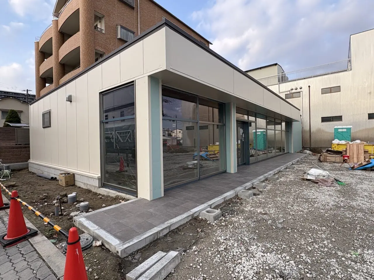 セブン-イレブン 大阪豊新２丁目店の開店予定地の建物外観